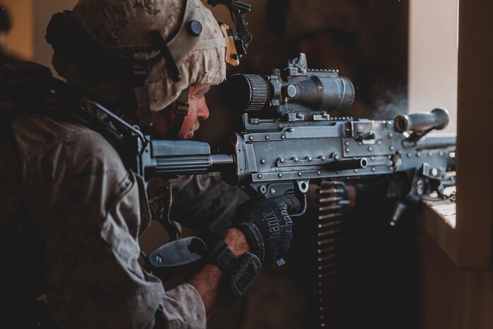 A U.S. Marine with 1st Marine Division provides suppressive fire during Marine Air Ground Task Force Warfighting Exercise 3-21 on Marine Corps Air Ground Combat Center, Twentynine Palms, California, May 7, 2021. MWX is the culminating event of the Service Level Training Exercise, challenging the MAGTF to fight against a free thinking adversary with similar capabilities in a force on force environment.