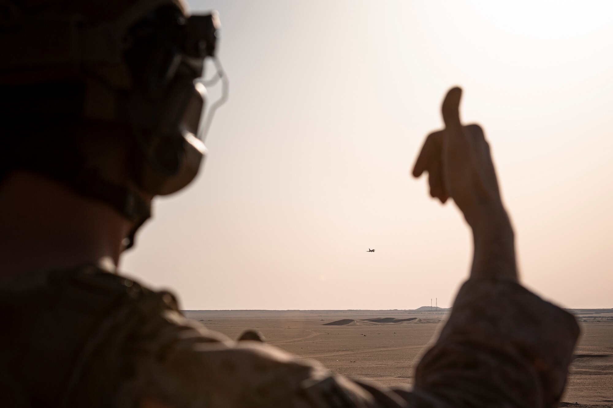 A photo of a Marine giving a thumbs up