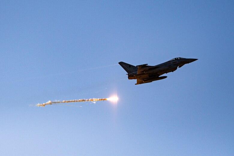 A photo of a Eurofighter Typhoon dropping flares