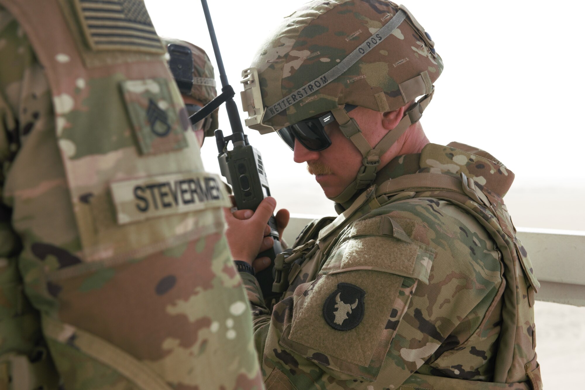 A photo of a Soldier using a radio