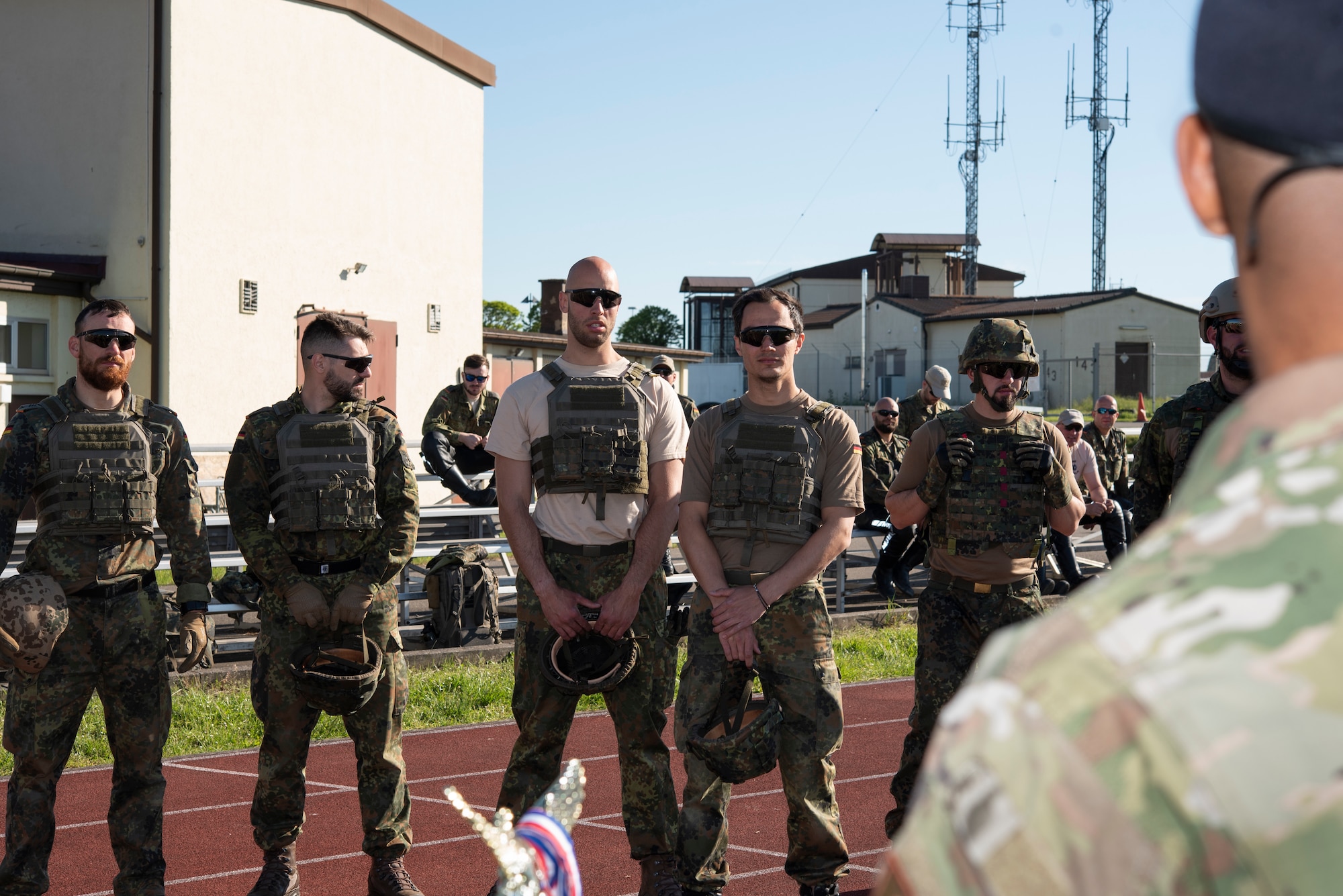 Military Police assigned to Germany’s Feldjäger Regiments 1 and 2 receive instructions for the Defender Challenge at Spangdahlem Air Base, Germany, June 2, 2021.