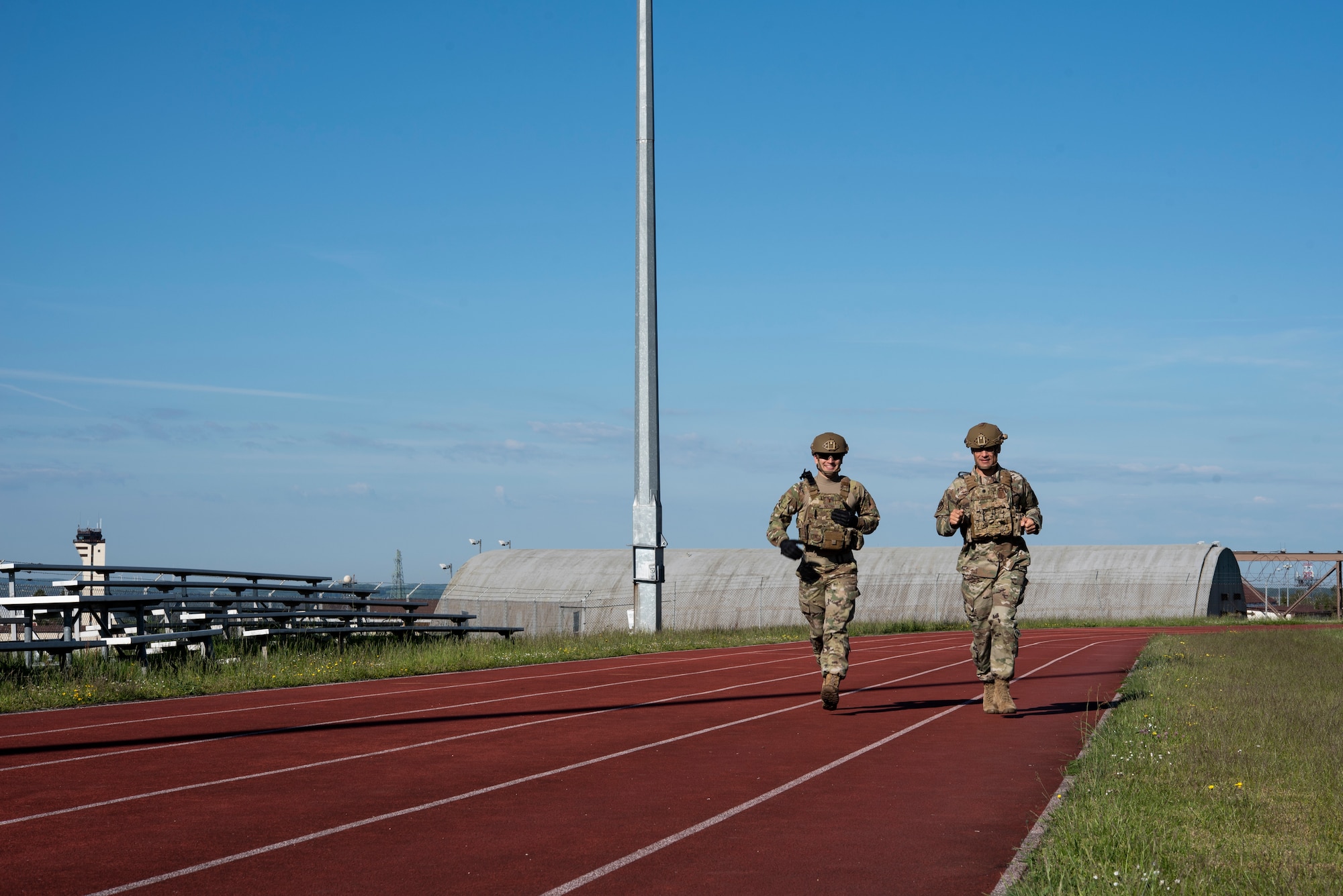 U.S. Air Force Lt. Col. Ben Washburn, 52nd Security Forces Squadron commander (right), and 2nd  Lt. Nicolas Niazian participate in the Defender Challenge at Spangdahlem Air Base, Germany, June 2, 2021.