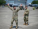 Tech. Sgt. Leo Otero, left, and Staff Sgt. Daniel Vanwormer, 103rd Security Forces Squadron, demonstrate detaining procedures during a training course on flight line security for the 103rd Maintenance Group at Bradley Air National Guard Base, East Granby, Connecticut, June 5, 2021. The course taught maintainers techniques for bolstering security, responding to potential threats before Security Forces personnel arrive.