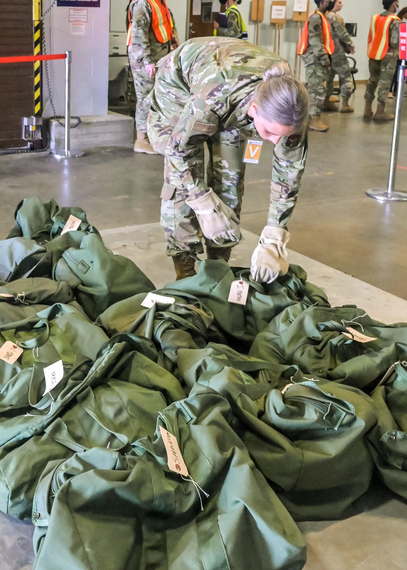 U.S. Air Force Reserve Airmen from the 913th Airlift Group prepare equipment to be palletized as part of the phase 1 deployment exercise June 6, 2021, at Little Rock Air Force Base, Arkansas. The event tested predeployment administrative processes and will identify areas of improvement before a real world deployment. (U.S. Air Force photo by Maj. Ashley Walker)