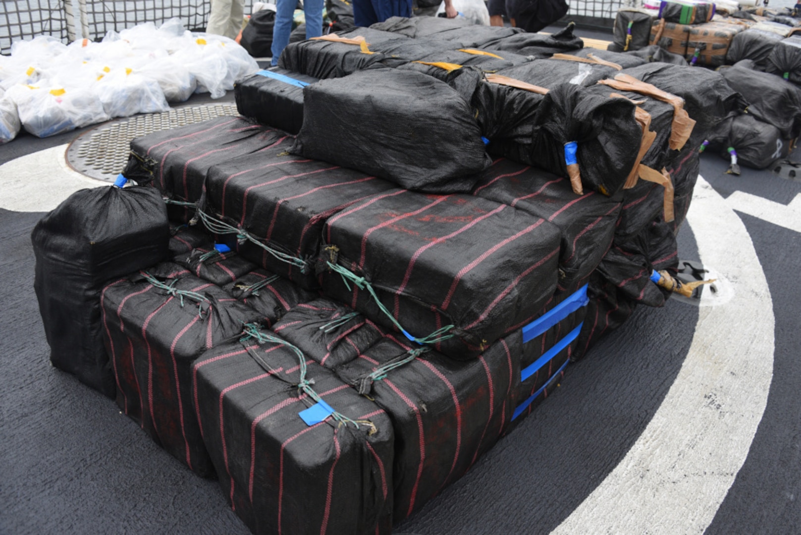 Bails of seized cocaine sit on the deck of the Coast Guard Cutter Active (WMEC 618) before being offloaded in San Diego, Wednesday. The drugs, worth an estimated $220 million, were seized in international waters of the Eastern Pacific Ocean during April and May. (Coast Guard photo by Petty Officer 3rd Class Alex Gray)