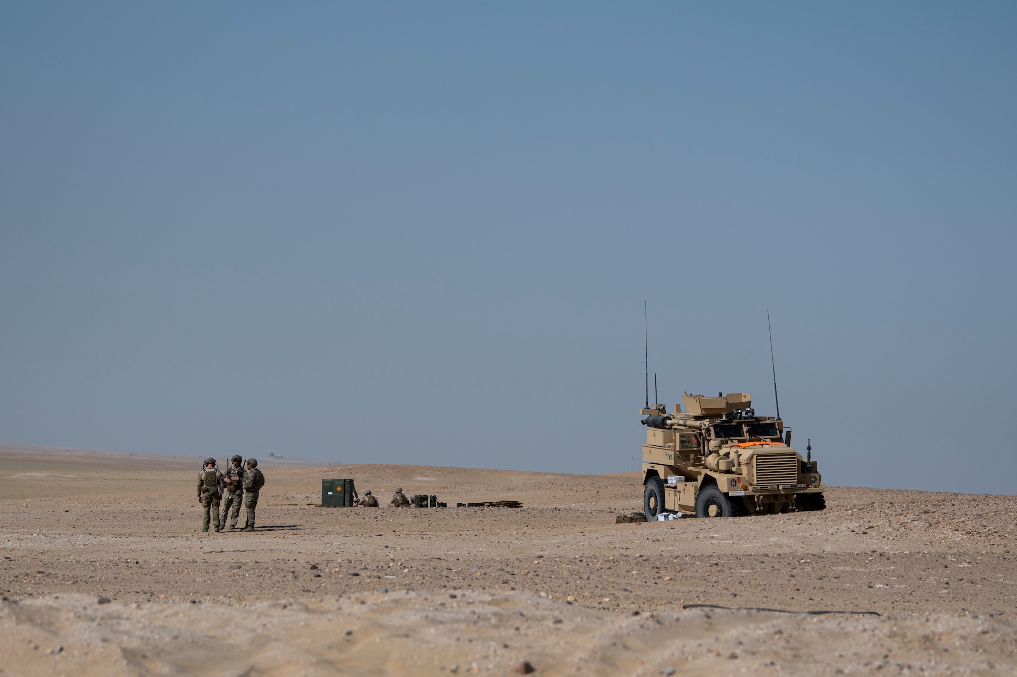 A photo of U.S. service members walking