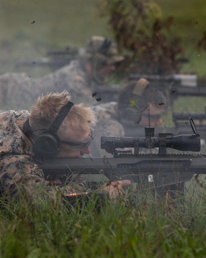 Marines with 3rd Force Reconnaissance Company, 4th Marine Division, fire down range during sniper training at Camp Shelby, Mississippi, on June 6, 2021. The Marines trained with the M107 semi-automatic long-range sniper rifle, an anti-materiel rifle that fires .50 caliber ammunition out to a maximum effective range of 2000 meters. (U.S. Marine Corps photo by Lance Cpl. David Intriago)