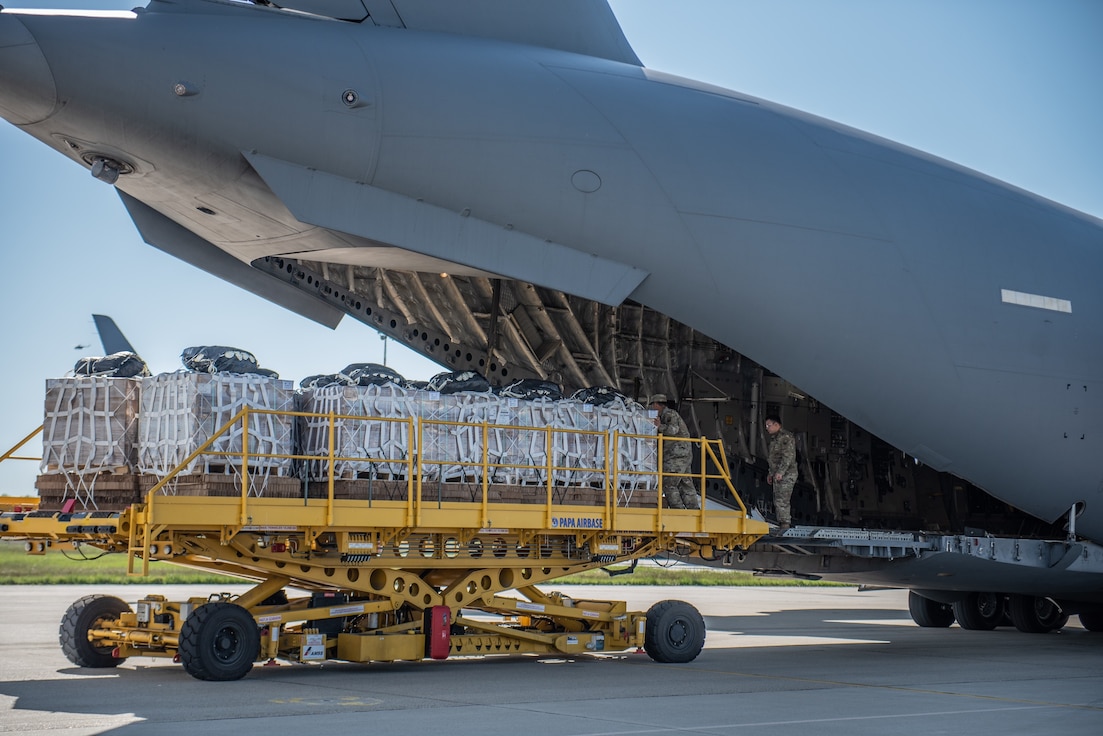 Soldiers from the 5th Quartermaster-Theater Aerial Delivery Company conduct heavy drop operations during Swift Response 21 at Papa, Hungary, May 10. Swift Response is a US Army-led multinational exercise involving more than 7,000 paratroopers from NATO Allies.