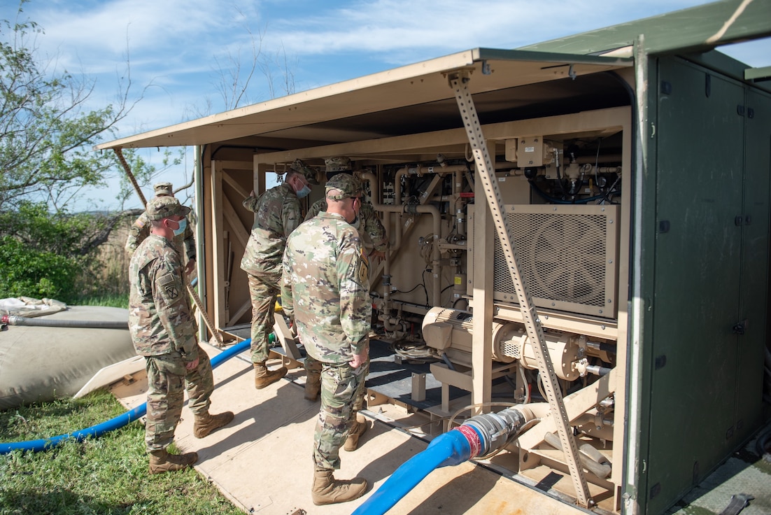 Soldiers from the 240th Composite Supply Company conduct water purification and laundry operations in support of Defender Europe 21, at Papa, Hungary, May 10.