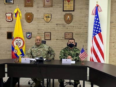 Col. Jeffrey Lopez, left, chief, U.S. Army South Security Cooperation Division, provides opening remarks with Lt. Col. Francisco Candela, right, deputy director, Colombian Army Bilateral Relations, to begin the U.S., Colombian Army Staff Talks at the Army Infantry School in Bogota, Colombia, June 9, 2021.

The U.S. Army Staff Talks Program serves as a bilateral engagement for military discussion between respective armies. This year marks the 12th time the U.S. Army and the Colombian Army have met for staff talks, which has been instrumental in enhancing the interoperability and cooperation between the two partners.