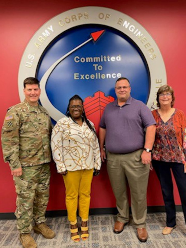 Col. Marvin Griffin, HNC commander (far left) and Kellie Williams, safety manager, (far right) recognize Project Delivery Team members Tonda Madison, supervisory contracting specialist, and Clay Weisenberger, attorney, for their support of the safety program. PDT members not pictured are Chris Robbins, project manager, and Bill Seelmann, contract specialist.