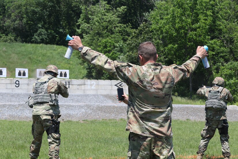 Sgt. 1st Class Michael Tompko, deputy director of the Adjutant General Match, prepares to signal the next phase of the competition during Adjutant General's Combined-Arms Match June 5, 2021, at Fort Indiantown Gap, Pa.