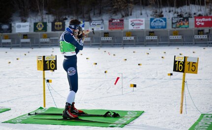 New Hampshire National Guard Spc. Thomas Echelberger shoots at the Biathlon Spring Fling on March 3, 2021, at Fort Kent, Maine. Echelberger placed sixth out of 35 competitors.