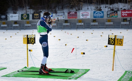 New Hampshire National Guard Spc. Thomas Echelberger shoots at the Biathlon Spring Fling on March 3, 2021, at Fort Kent, Maine. Echelberger placed sixth out of 35 competitors.