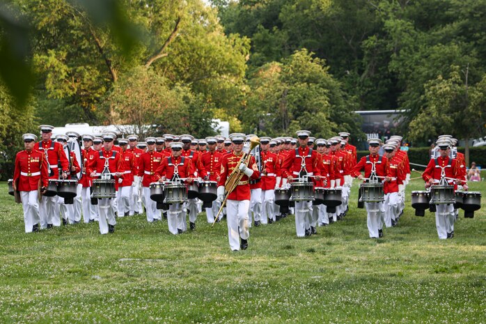 Marines with “The Commandant’s Own,” U.S. Marine Drum and Bugle Corps, perform during a Tuesday Sunset Parade at the Marine Corps War Memorial, Arlington, Va., June 8, 2021.
