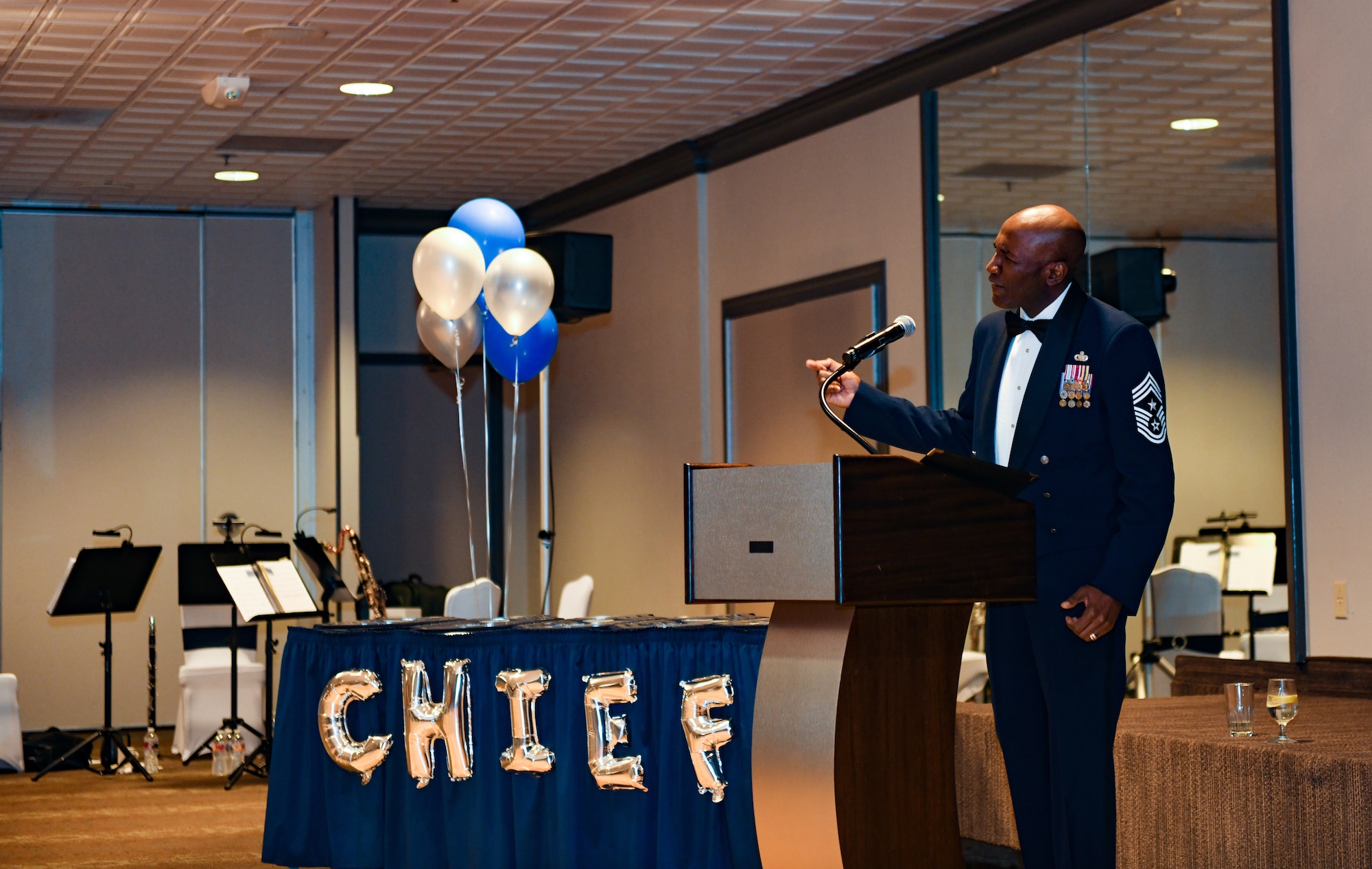 Man at podium speaking
