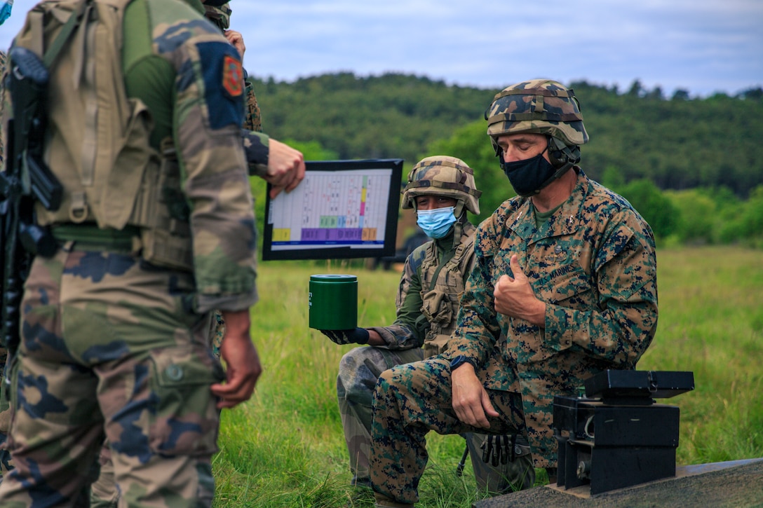 U.S. Marine Corps Maj. Gen. Francis Donovan, commanding general of 2d Marine Division, observes a dynamic display with 3rd Marine Artillery Regiment, 6th Light Armoured Brigade, on Military Camp of Canjuers, France, June 1, 2021. Donovan’s visit to France included engagements with key leaders to strengthen relationships with the French Armed Forces in order to refine interoperability for future cooperation. (U.S. Marine Corps photo by Sgt. Margaret Gale)