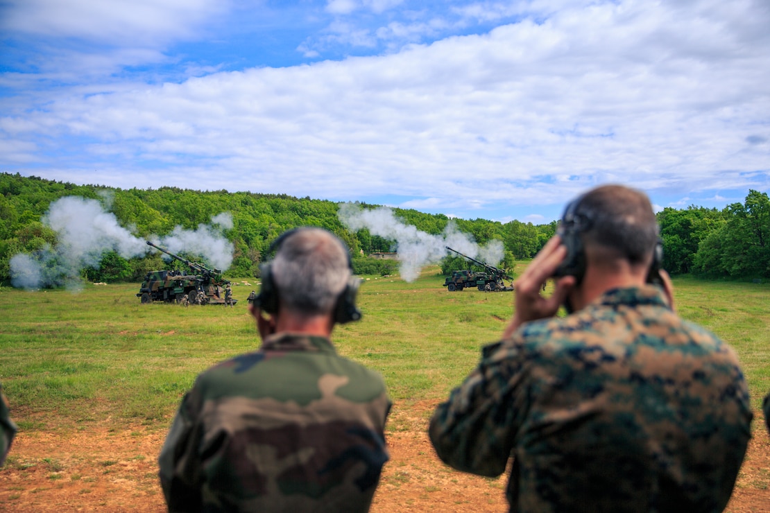 U.S. Marine Corps Maj. Gen. Francis Donovan, commanding general of 2d Marine Division, observes a dynamic display with 3rd Marine Artillery Regiment, 6th Light Armoured Brigade, on Military Camp of Canjuers, France, June 1, 2021. Donovan’s visit to France included engagements with key leaders to strengthen relationships with the French Armed Forces in order to refine interoperability for future cooperation. (U.S. Marine Corps photo by Sgt. Margaret Gale)
