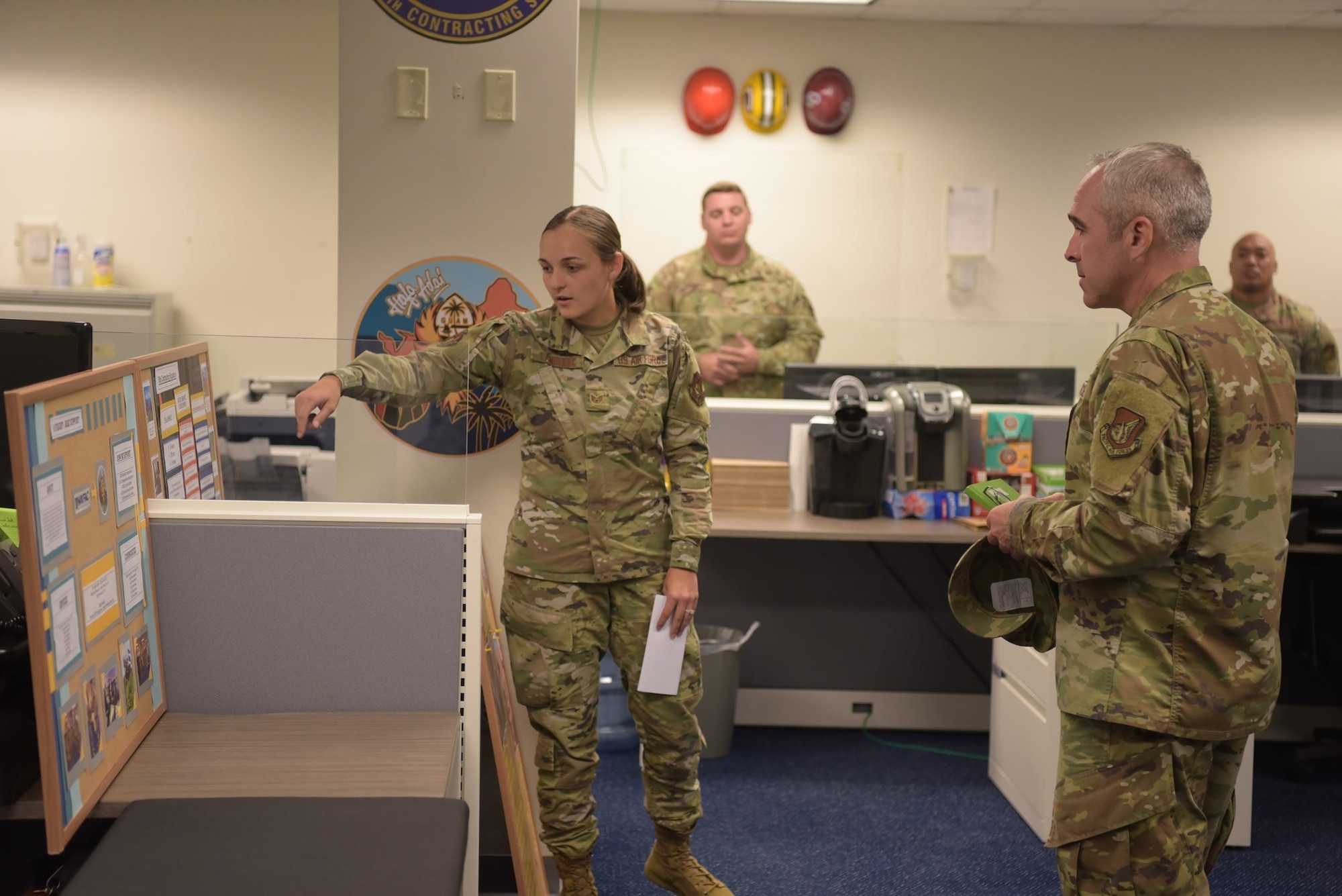 U.S. Air Force Chief Master Sgt. Kristopher Berg, 11th Air Force Command Chief, receives a brief about the 36th Contracting Squadron, June 7, 2021, at Andersen Air Force Base, Guam.