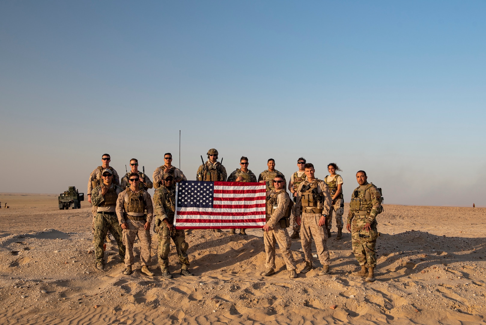 A photo of U.S. service members posing for a photo