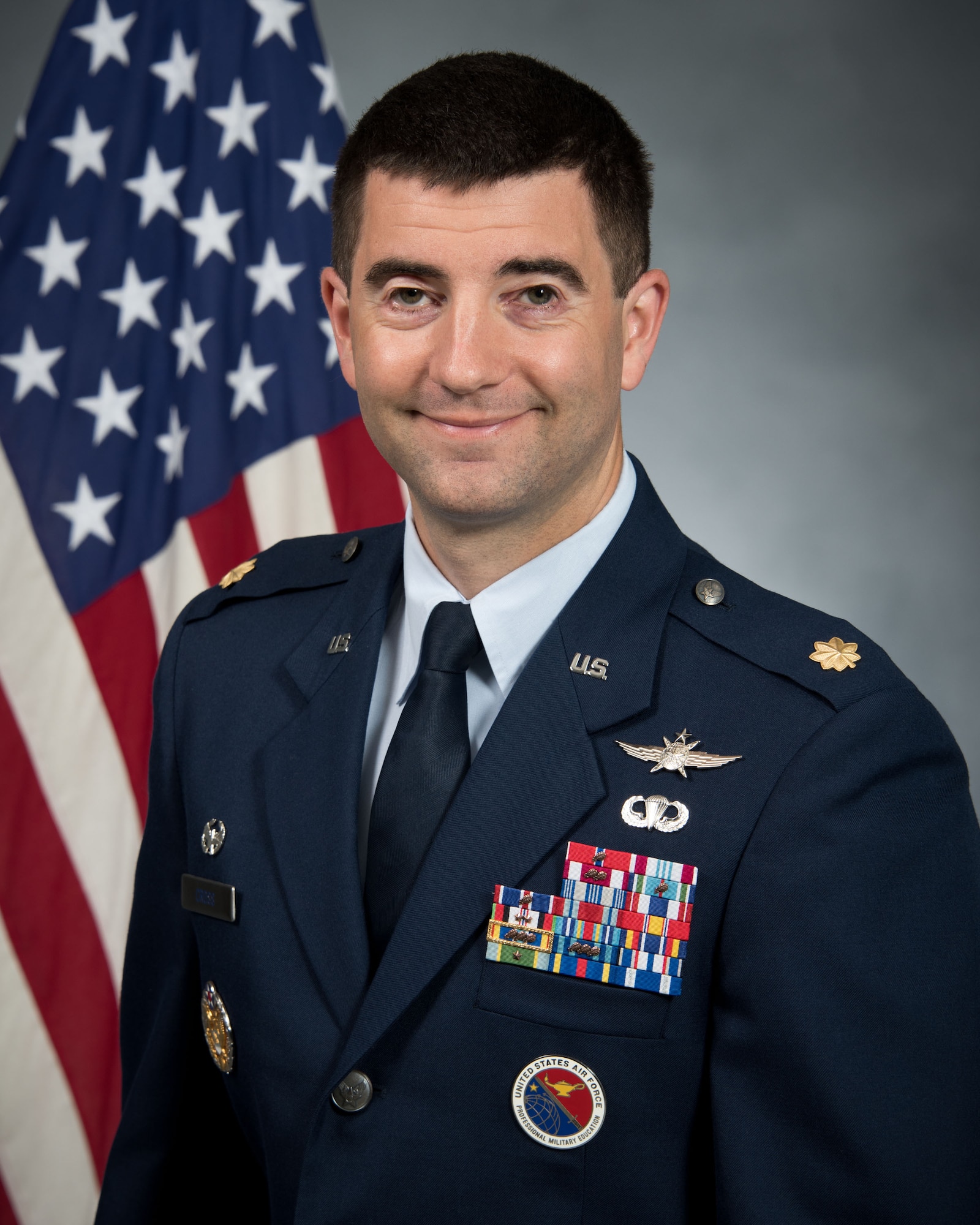 U.S. Air Force Maj. Adam Cross, 422nd Communications Squadron commander, poses for an official photo. (Courtesy photo)