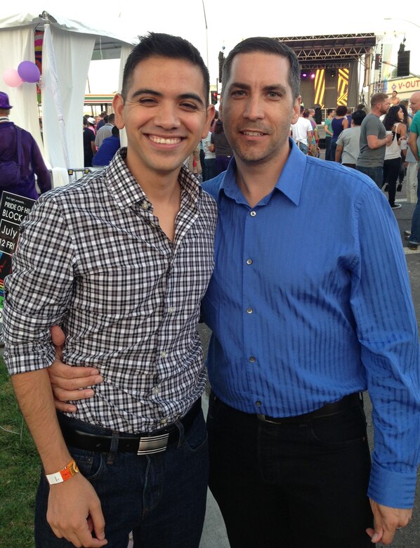 Brady McCarron, a civilian public affairs specialist assigned to Joint Base Anacostia-Bolling, Washington D.C., poses for a photo with his husband, Alex, at a San Diego Pride event in 2008 shortly after they were married. McCarron served as a public affairs Airman until his retirement in 2007. (Courtesy photo)