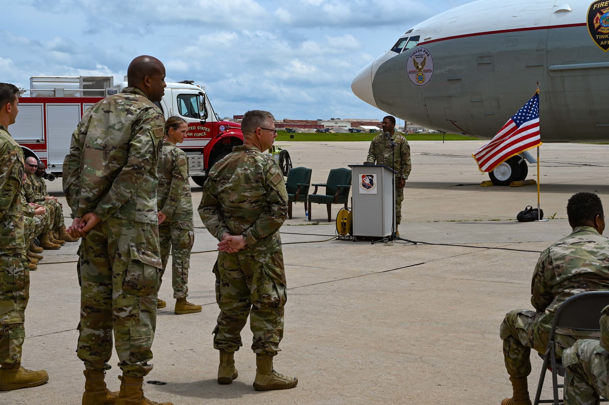Lt. Col. Dustin Born, 507th Civil Engineer Squadron former commander, relinquishes command to Lt. Col. Stan Young, 507th Mission Support Group commander, during an outdoor change of command ceremony on the flightline June 6, 2021, at Tinker Air Force Base, Oklahoma. (U.S. Air Force photo by Senior Airman Mary Begy)