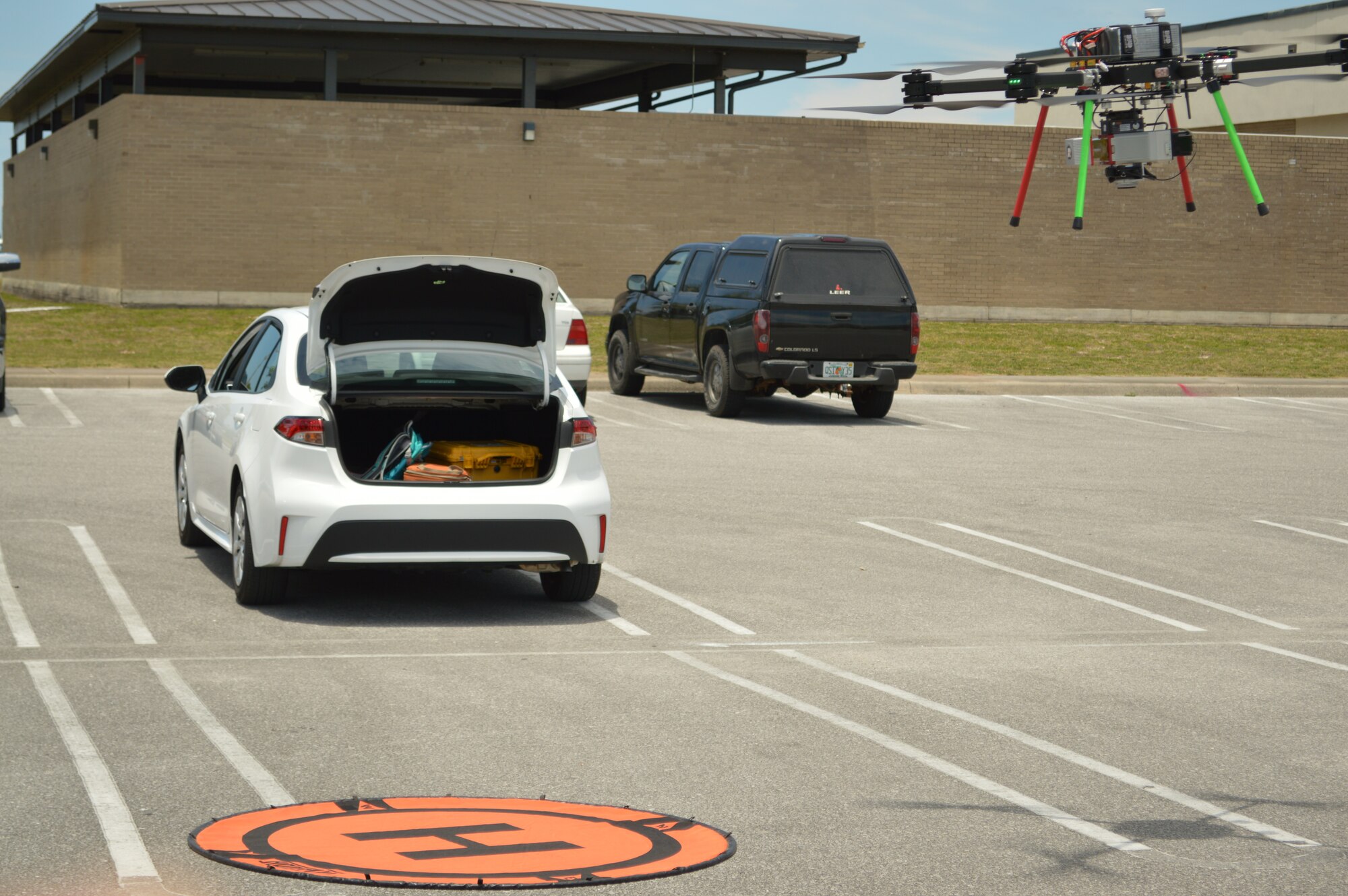 A drone prepares to land after a flight at Tyndall Air Force Base, Florida, June 4, 2021. The drone captured data for a Digital Twin replica of the installation. (U.S. Air Force photo by Sarah McNair)