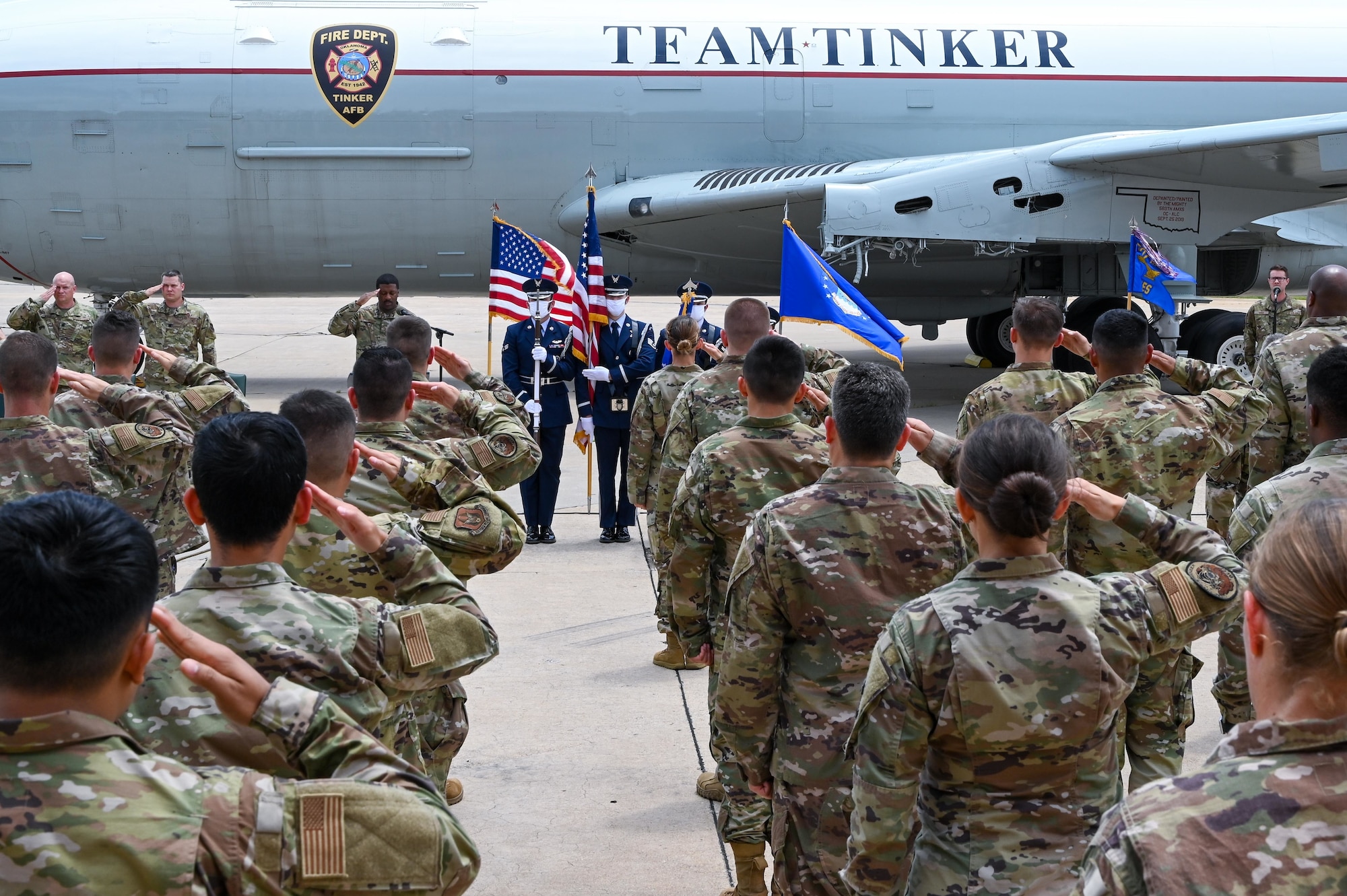 The 507th Civil Engineer Squadron presents arms during an outdoor change of command ceremony on the flightline June 6, 2021, at Tinker Air Force Base, Oklahoma. (U.S. Air Force photo by Senior Airman Mary Begy)