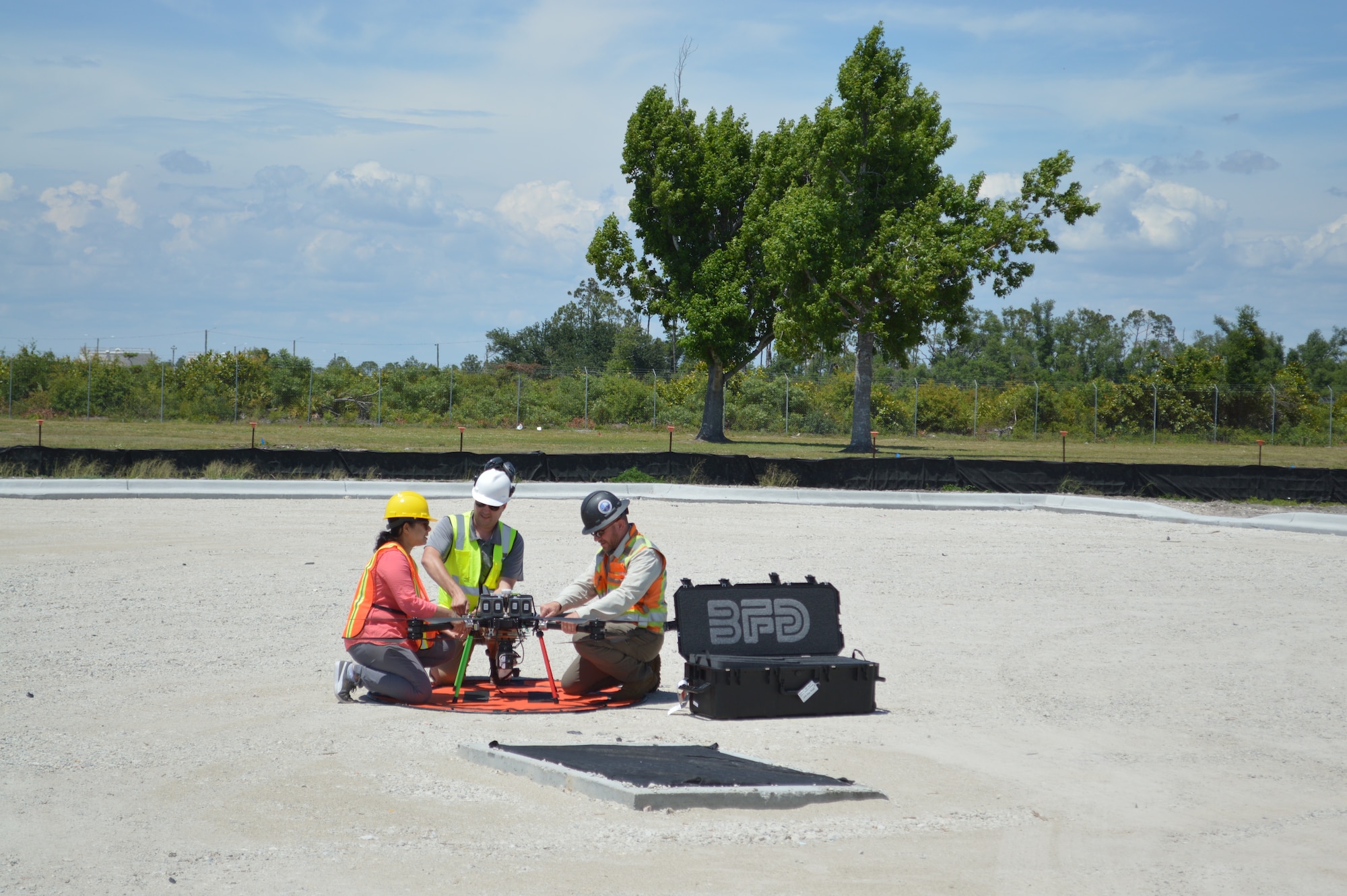 Technicians prepare a drone for flight at Tyndall Air Force Base, Florida, June 4, 2021. The drone captured data for a Digital Twin replica of the installation. (U.S. Air Force photo by Sarah McNair)