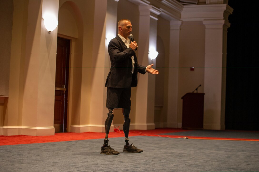 Rob Jones, Afghanistan veteran and motivational speaker, speaks to Marine Barracks Washington personnel during a seminar at MBW, June 09, 2021. After losing both legs in Afghanistan, Jones accomplished 31 marathons, in 31 days, in 31 different cities while raising over $200,000 for the Coalition to Salute America’s Heroes. (U.S. Marine Corps photo by Lance Cpl. Mark Morales)