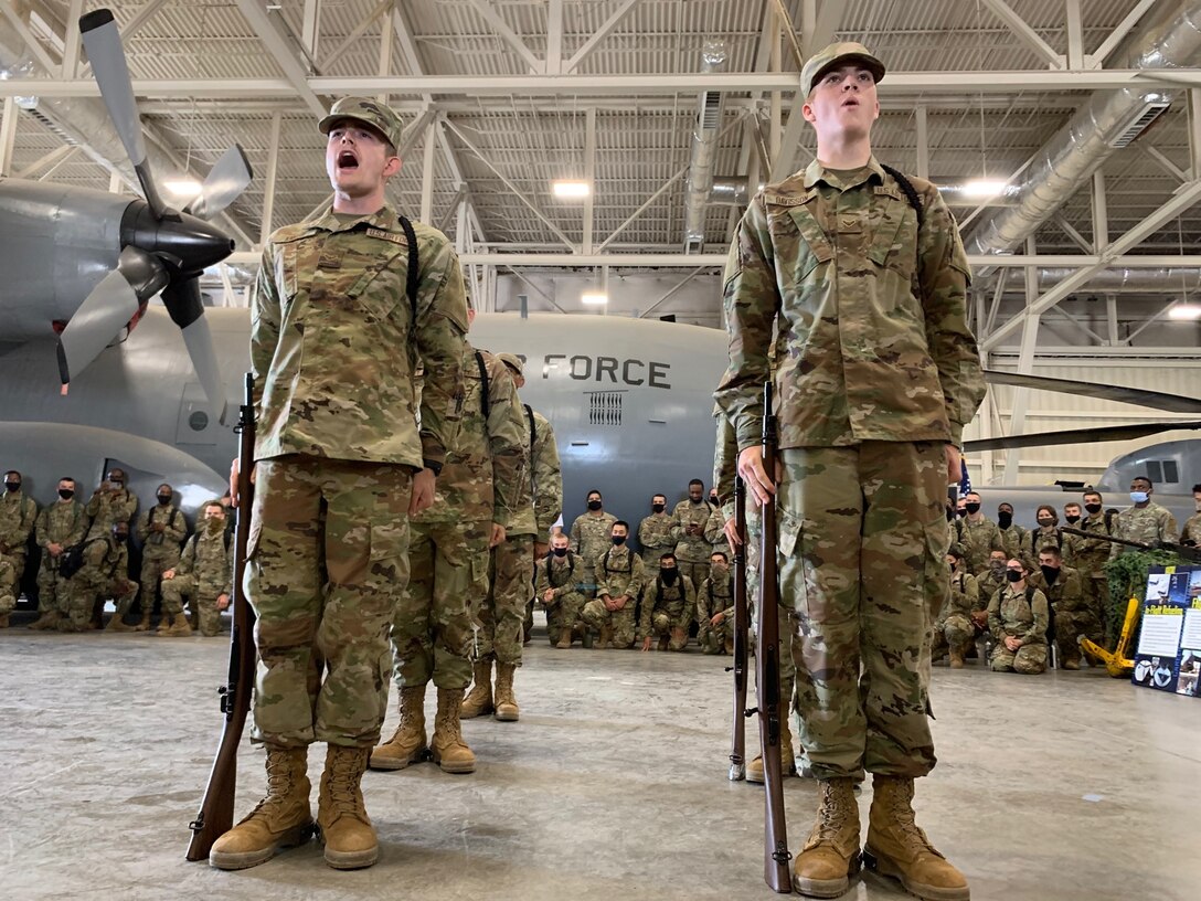 Airmen in drill formation.