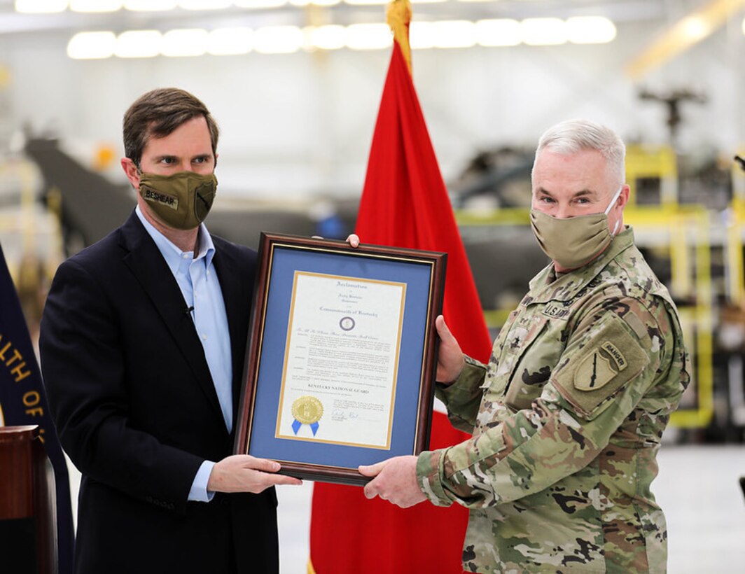 Governor Andy Beshear visited Kentucky's Boone National Guard Center, March 12 to present an Acclamation award to members of the National Guard who supported the inauguration In January, more than 300 Soldiers and Airmen mobilized to assist federal agencies in security the Nations Capital during the 59th Presidential Inauguration. During the Ceremony six Service members were additionally recognized for their dedication and commitment to the commonwealth for going above and beyond the call of duty.