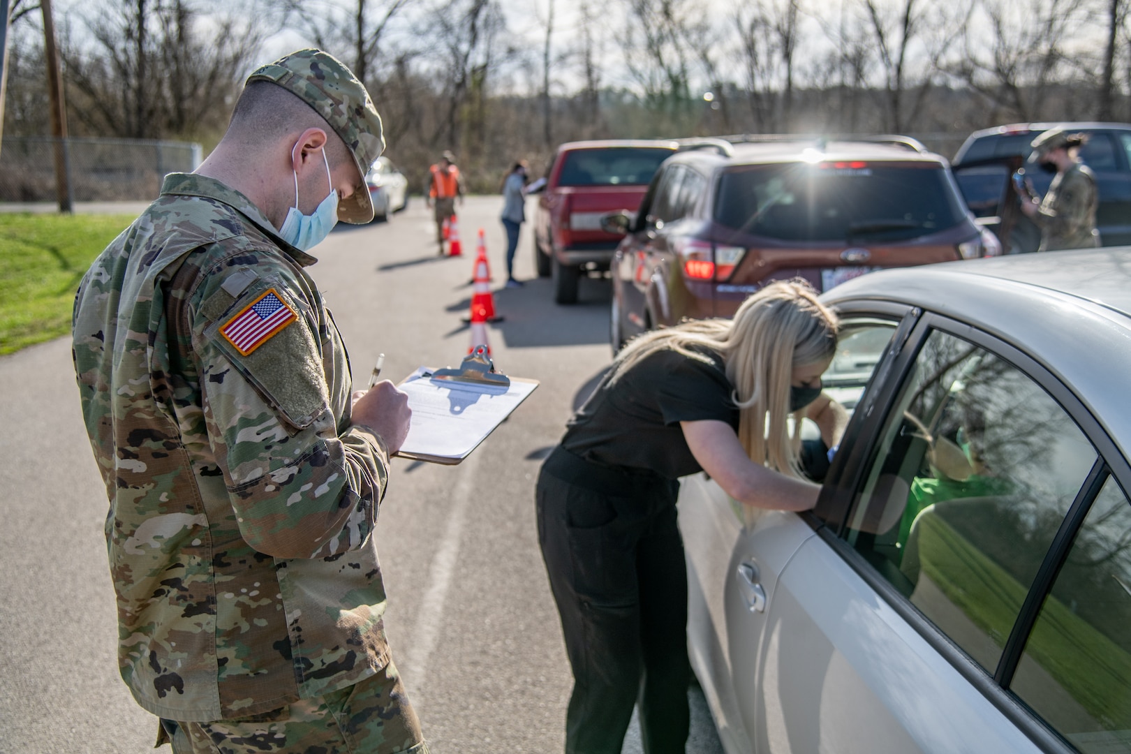 Members of the West Virginia National Guard conduct a mobile vaccination clinic for the Johnson & Johnson COVID-19 vaccine in Ft. Gay, West Virginia, Mar. 19, 2021. Members of the Guard partnered with members of the Wayne County Health Department, Marshall School of Pharmacy, and local law enforcement to administer more than 350 doses of the life-saving vaccines to rural residents of Wayne County. (U.S. Army National Guard photo by Edwin L. Wriston)