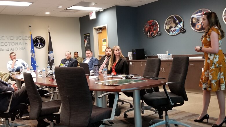 AFRL’s Rachel Delaney, SSPIDR project communication lead, briefs Senator Martin Heinrich (D-NM) June 3 on the technical aspects of the program that will capture the sun’s energy on orbit and beam it to the ground for on-demand power in areas where fossil fuel is both costly and dangerous to transport. Also shown seated at the table, from left to right: Dr. Andy Williams, Space Mission Area Lead, AFRL Space Vehicles Directorate; Jason Jarvis, Field Representative to Sen. Heinrich; Mike Sullivan, Senior Advisor to Sen. Heinrich; and Constance Moyer, SSPIDR Project Coordinator. (Courtesy photo)
