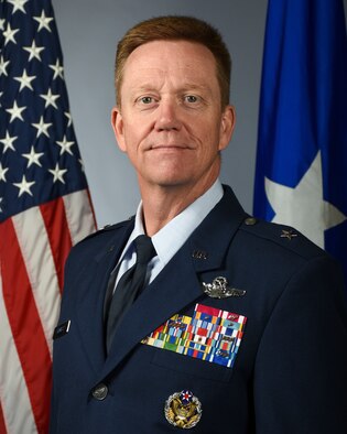 Brig. Gen. Mike Schultz, the 442d Fighter Wing commander, poses for an official photo.