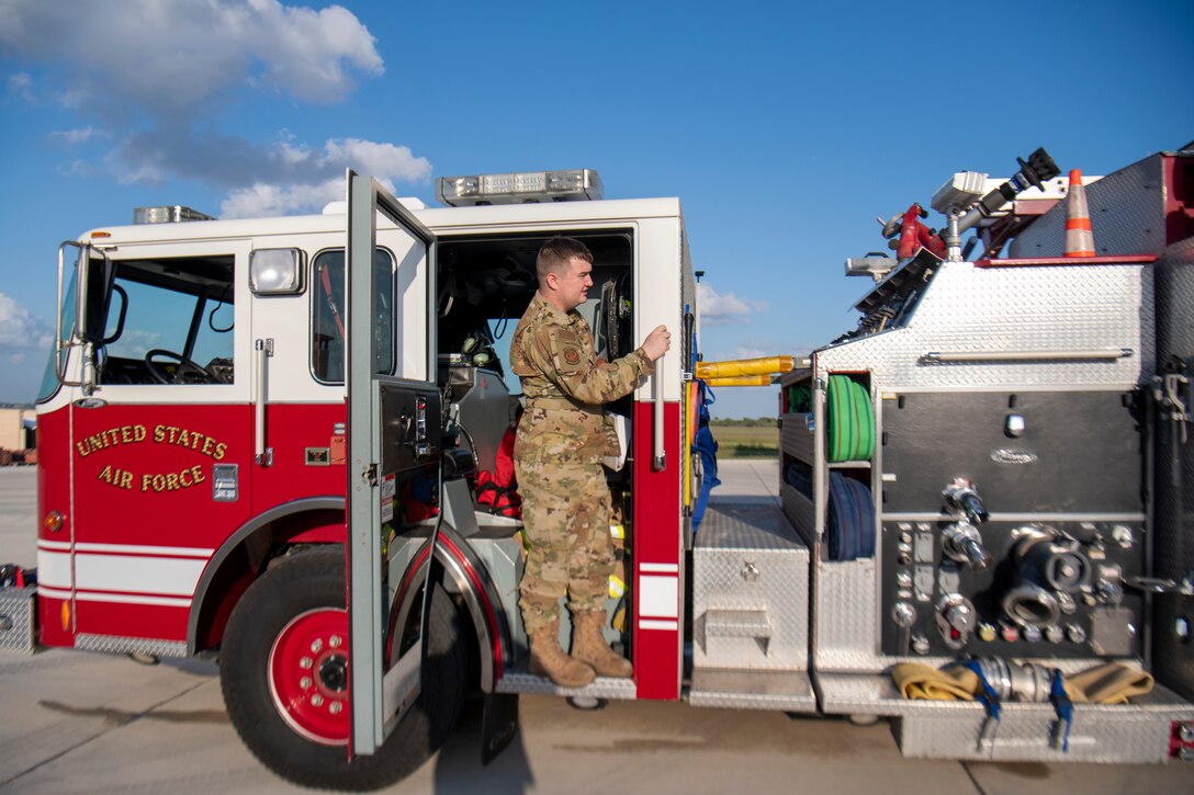 Airman 1st Class, Keith Johnson, 45th Civil Engineer Squadron firefighter, performs a vehicle inspection at Patrick Space Force Base, Fla., May 21, 2021. Johnson was one of the firefighters who responded to the beach April 17 to aid the pilot of a TBM Avenger that crashed in the ocean. (U.S. Space Force photo by Tech. Sgt. James Hodgman)