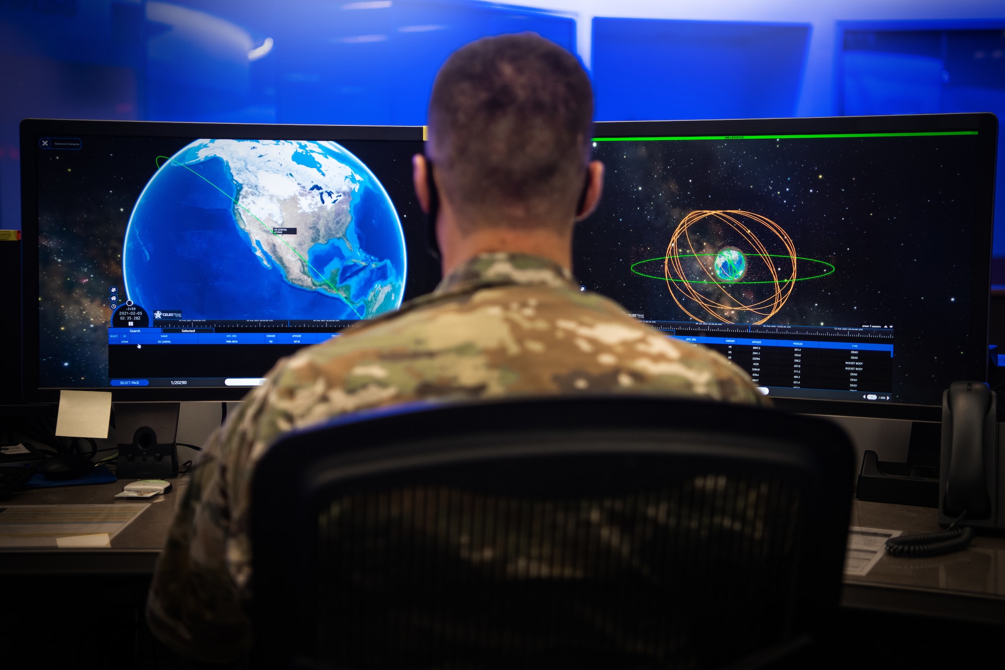 Member looks at space domain imagery in the National Space Defense Center.