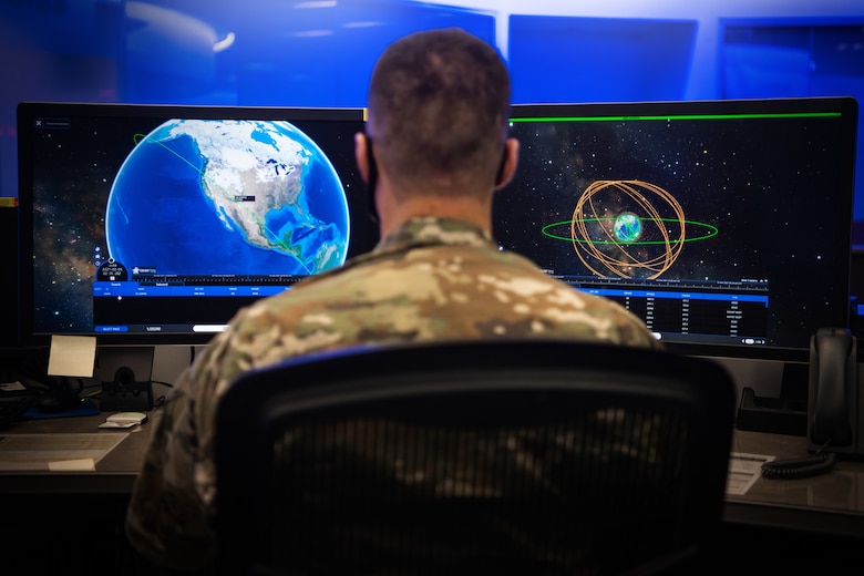 Member looks at space domain imagery in the National Space Defense Center.