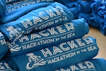 Students participating in the 2021 Hackathon by the Sea competition received a shirt to commemorate the two-day event hosted by NSWC PHD, Naval Air Warfare Center Weapons Division, and Naval Facilities Engineering and Expeditionary Warfare Center, in partnership with the Ventura County Office of Education. The theme this year was “Hack The Future.
