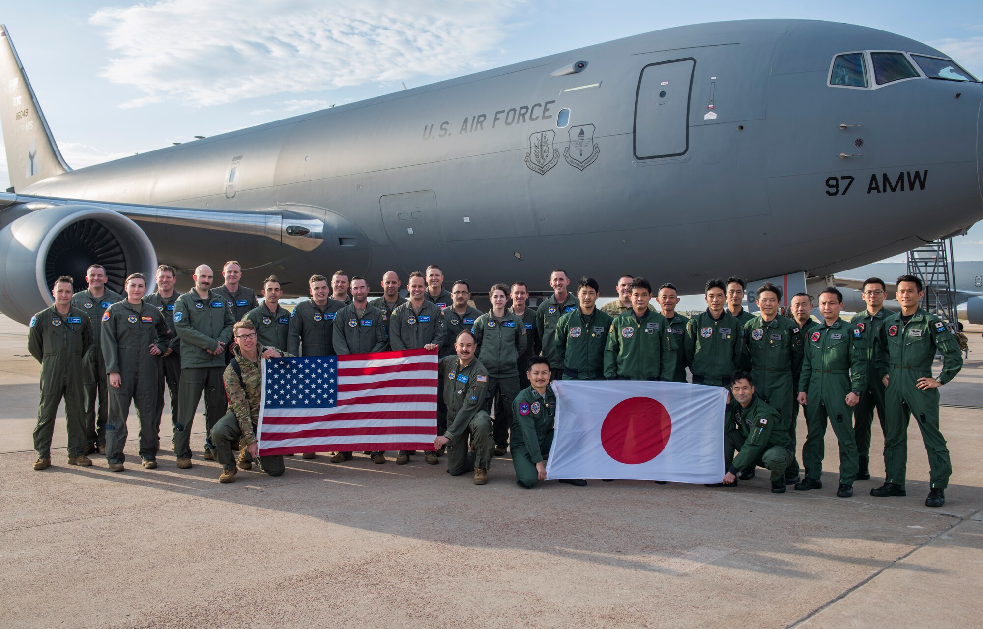 U.S. Air Force Airmen from the 56th Air Refueling Squadron and Japanese aircrew students pose for a photo in front of a KC-46 Pegasus, May 12, 2021, at Altus Air Force Base, Oklahoma. The students are the first U.S. allies to train on the KC-46. (U.S. Air Force photo by Airman 1st Class Amanda Lovelace)