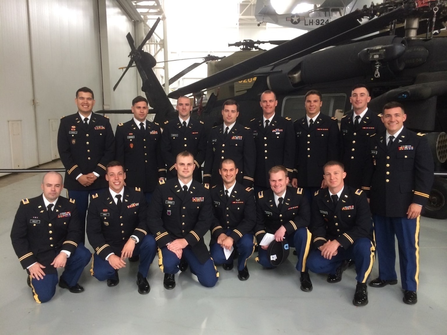U.S. Army Chief Warrant Officer Mauricio Garcia, a freshly minted UH-60M Black Hawk pilot, poses with his classmates after graduation from the UH-60M qualification course at Fort Rucker, Alabama. (Courtesy photo)