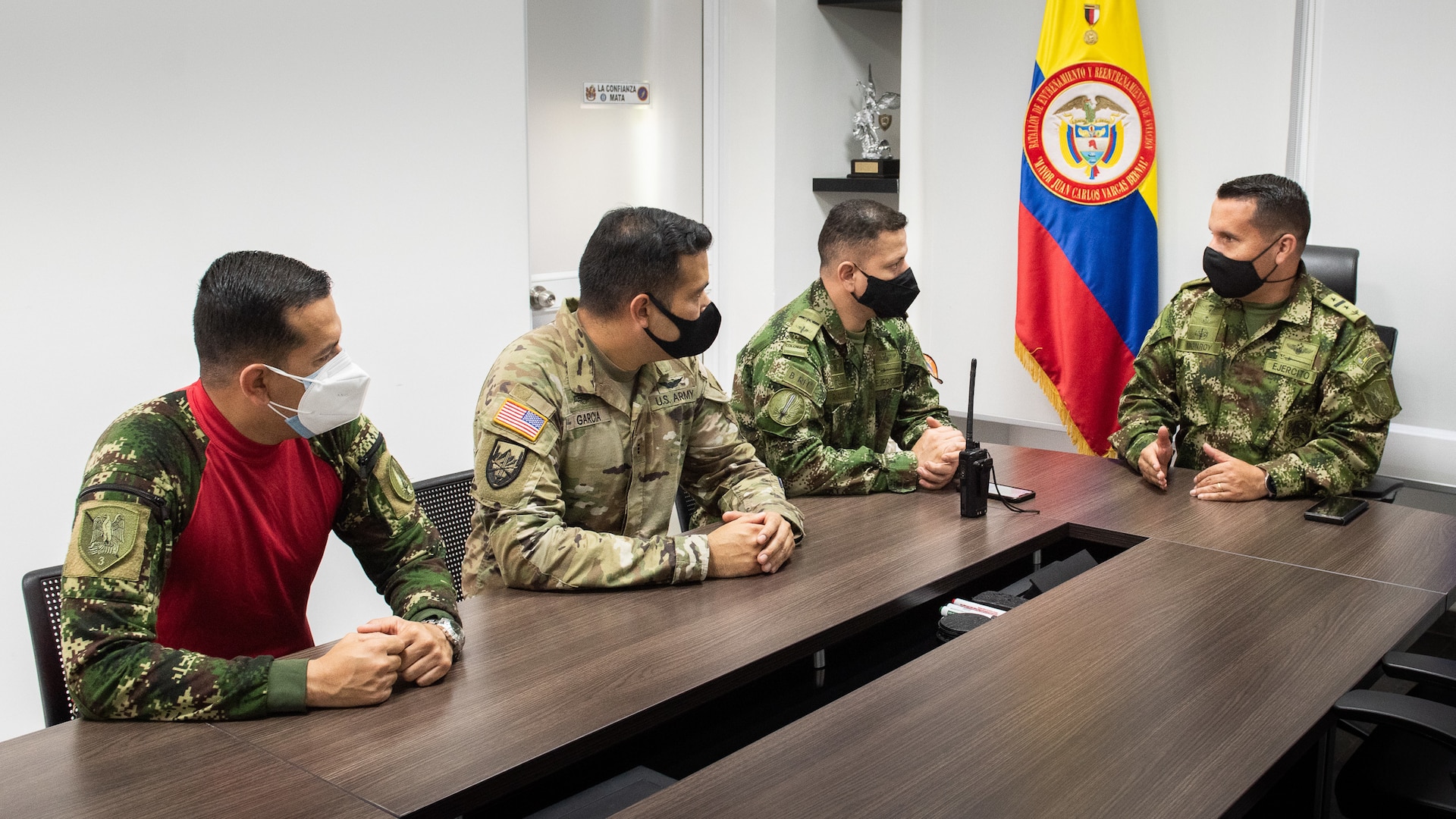 U.S. Army Chief Warrant Officer 3 Mauricio Garcia, meets with Lt. Col Milton Monroy, the Aviation Training Battalion commander, and staff at the Tolemaida Army Base, Colombia.