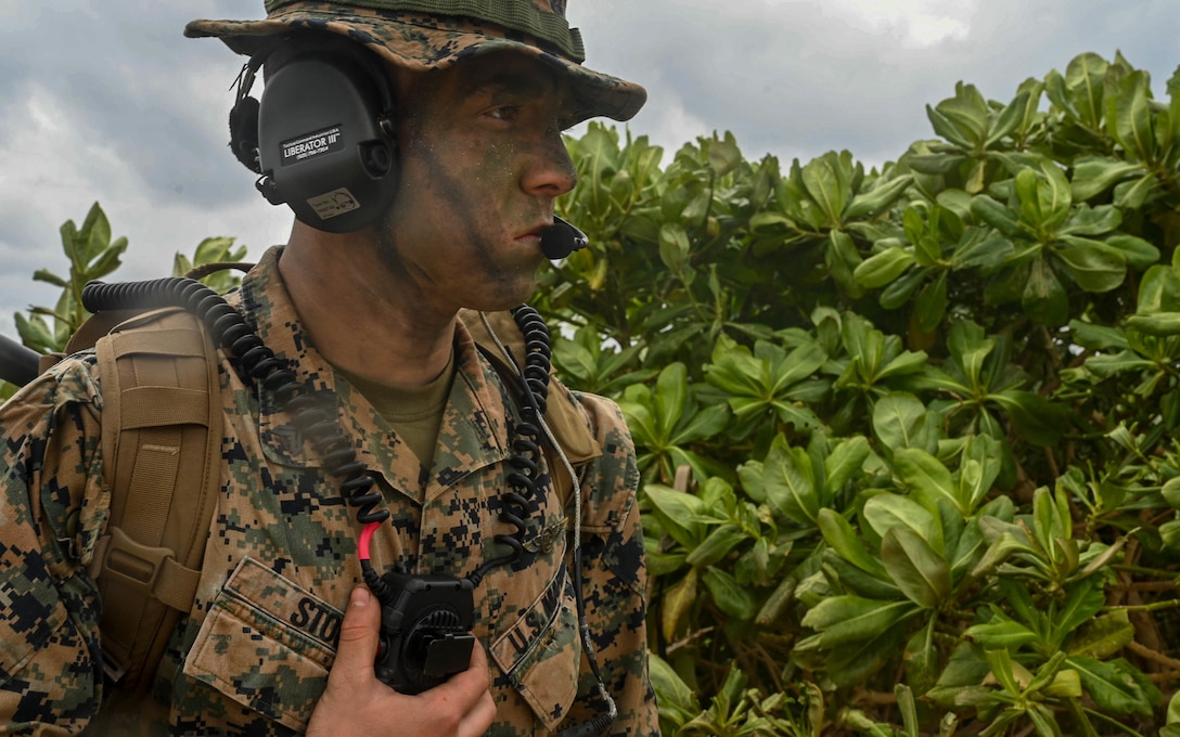 A U.S. Marine with Marine Air Control Squadron 4 establishes communications during exercise Hagåtña Fury 21 on Ukibaru, Japan, Feb 18, 2021. The exercise demonstrated that Marines are capable of seizing, defending, and providing expeditionary sustainment for key maritime terrain in support of the III Marine Expeditionary Force. 3/8 is attached to 3d Marine Division as a part of the unit deployment program.