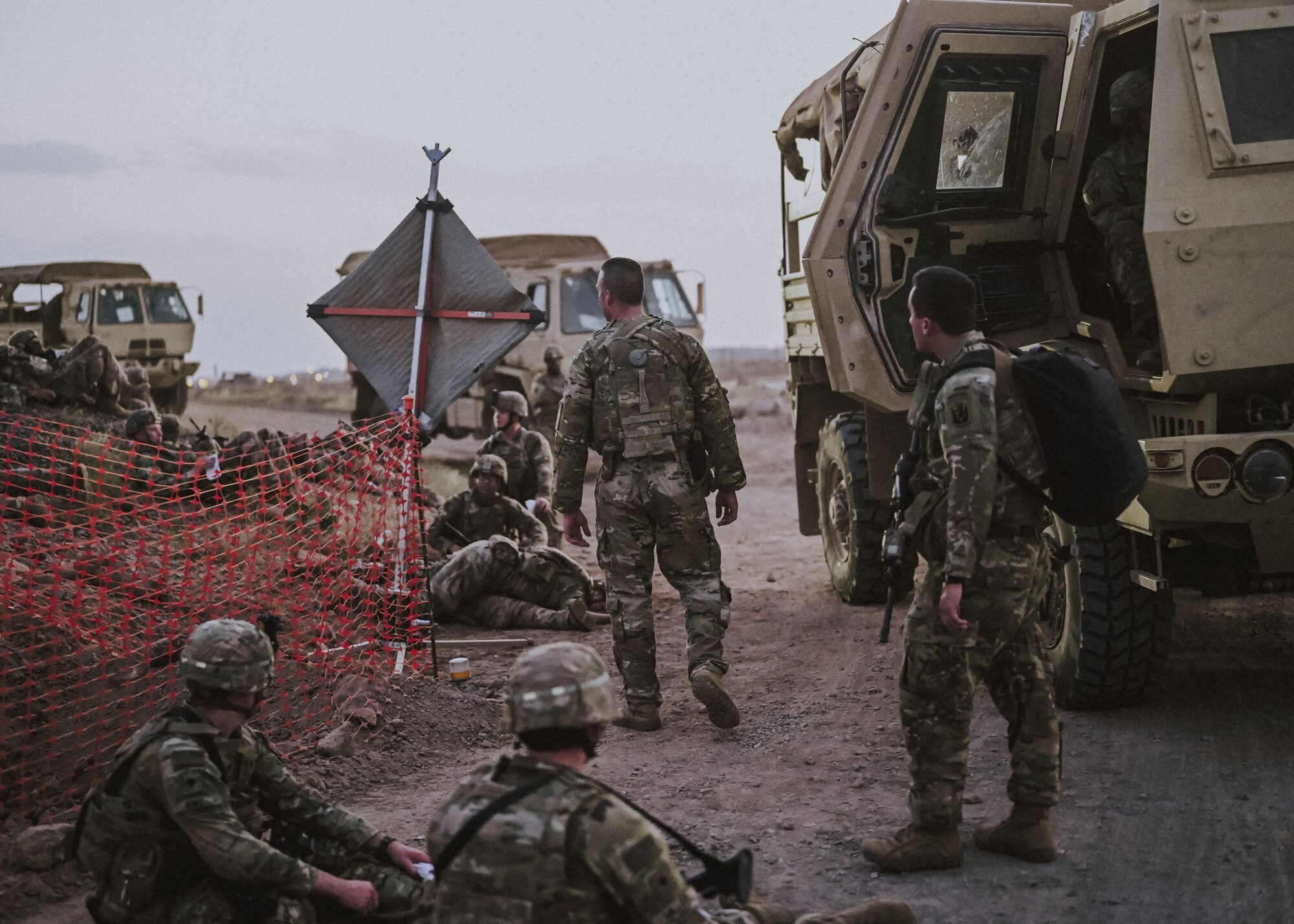 Soldiers from Task Force Iron Gray prepare for the medical evacuation exercise May 31, 2021 at Chabelley Airfield, Djibouti. The exercise included the 776th EABS fire department, medical aid station along with the Task Force Iron Gray, Combined Joint Task Force- Horn of Africa, personnel recovery coordination center and the French Air Force. (U. S. Air Force photo by Airman 1st Class Jan K. Valle)