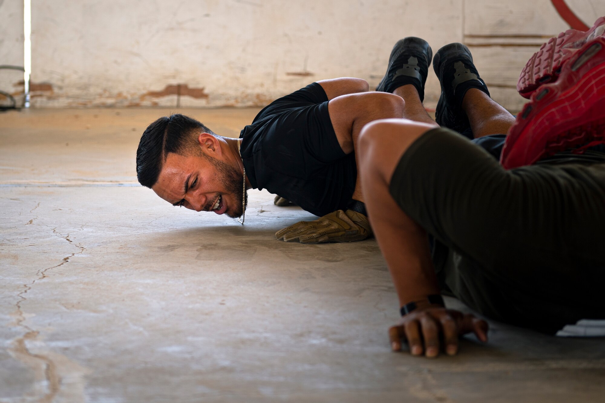 A photo of Airmen performing push ups