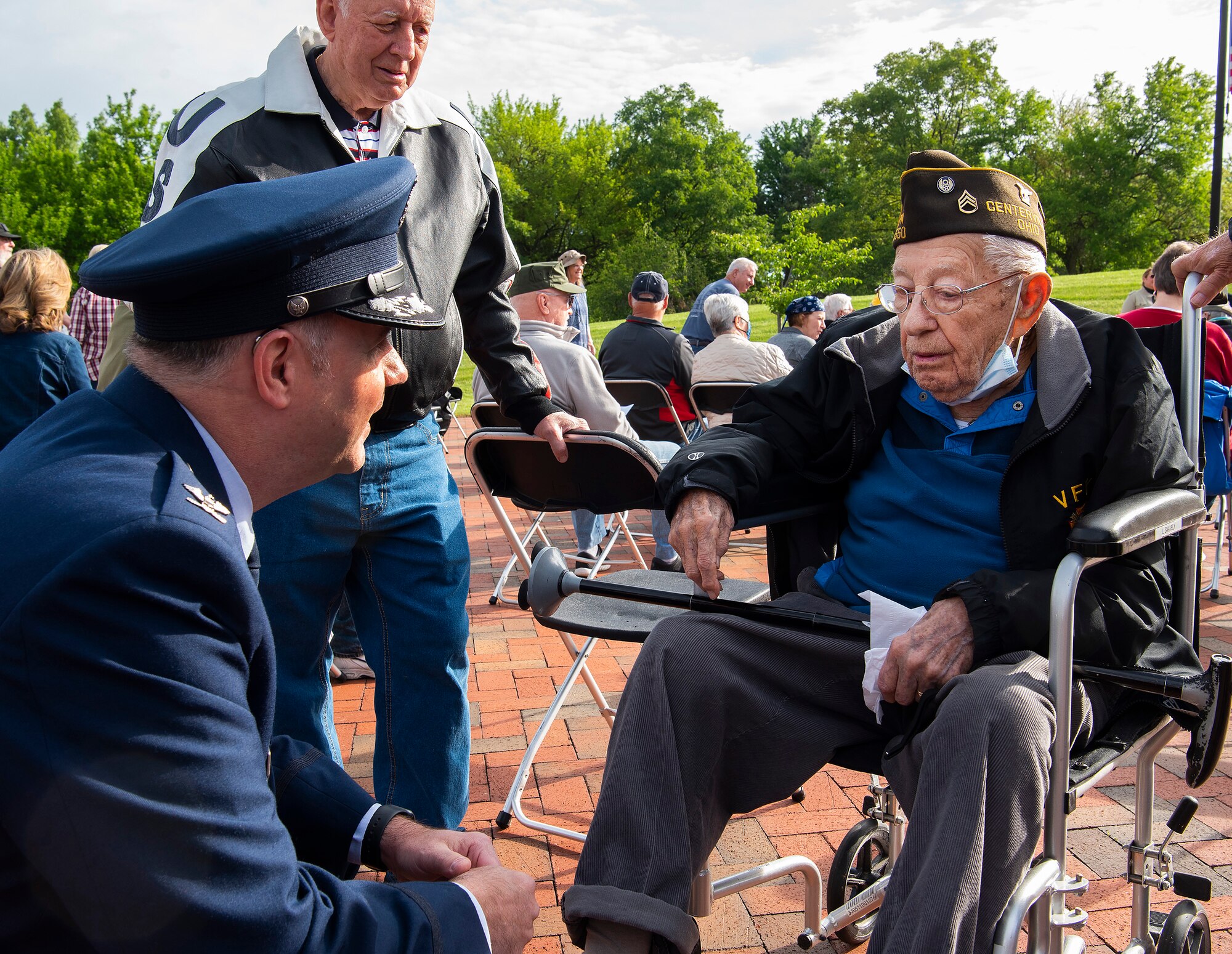 U.S. Air Force Col. Michael Phillips, 88th Air Base Wing vice commander, visits with Ken Snavely, a 103-year-old veteran who served with the 8th Air Force in World War II, prior to the Centerville, Ohio, Memorial Day ceremony May 31, 2021. Phillips was the event’s keynote speaker. (U.S. Air Force photo by R.J. Oriez)
