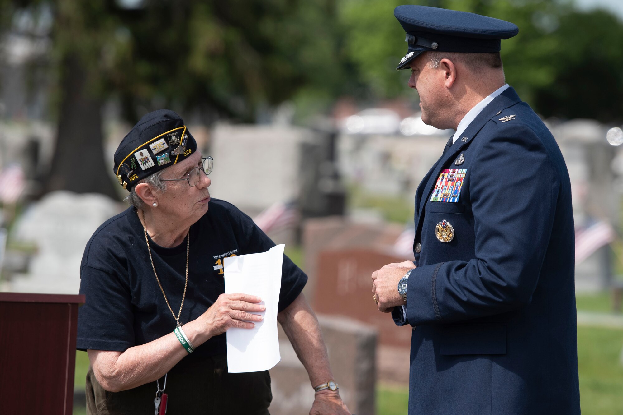 U.S. Air Force Col. Patrick Miller, 88th Air Base Wing and Wright-Patterson Air Force Base, Ohio, talks Anne Foster, American Legion Post 526 historian and Air Force veteran, prior to a Memorial Day ceremony in Fairborn, Ohio, May 31, 2021. Established in 1971, Memorial Day is an official federal holiday meant to allow people to honor the men and women who have died while on duty with the U.S. Military. (U.S. Air Force photo by Wesley Farnsworth)