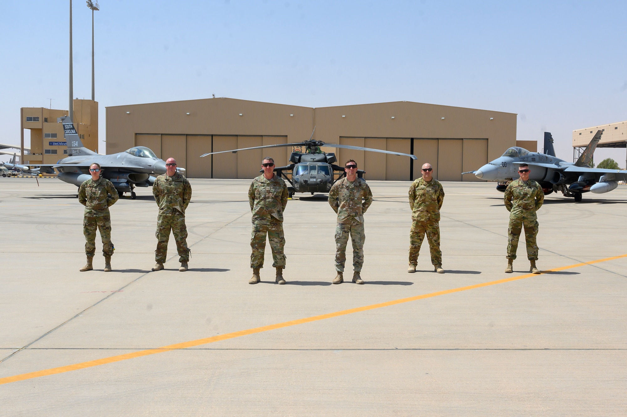 Photo of 378 AEW leadership on flight line
