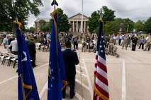 Airmen gather before a commemoration ceremony for the Air Transportation career field, and retired U.S. Air Force Col. Lawrence Lane, former security forces raven officer, on Scott Air Force Base, Illinois, June 08, 2021. The Air Transportation commemoration ceremony was held back in 2020 due to COVID-19, and was pushed to be highlighted on the same day of Lane’s commemoration ceremony. (U.S. Air Force Photo by Airman 1st Class Isaac Olivera)